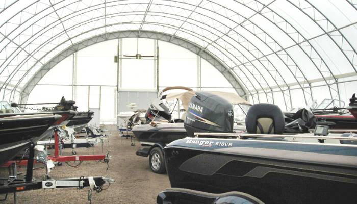 Fabric-covered indoor boat storage structure